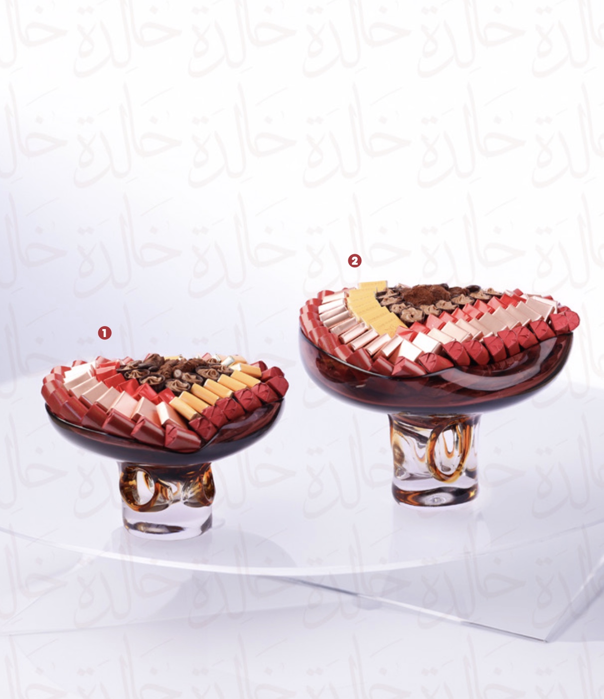 Coupe design en verre sur pied transparent